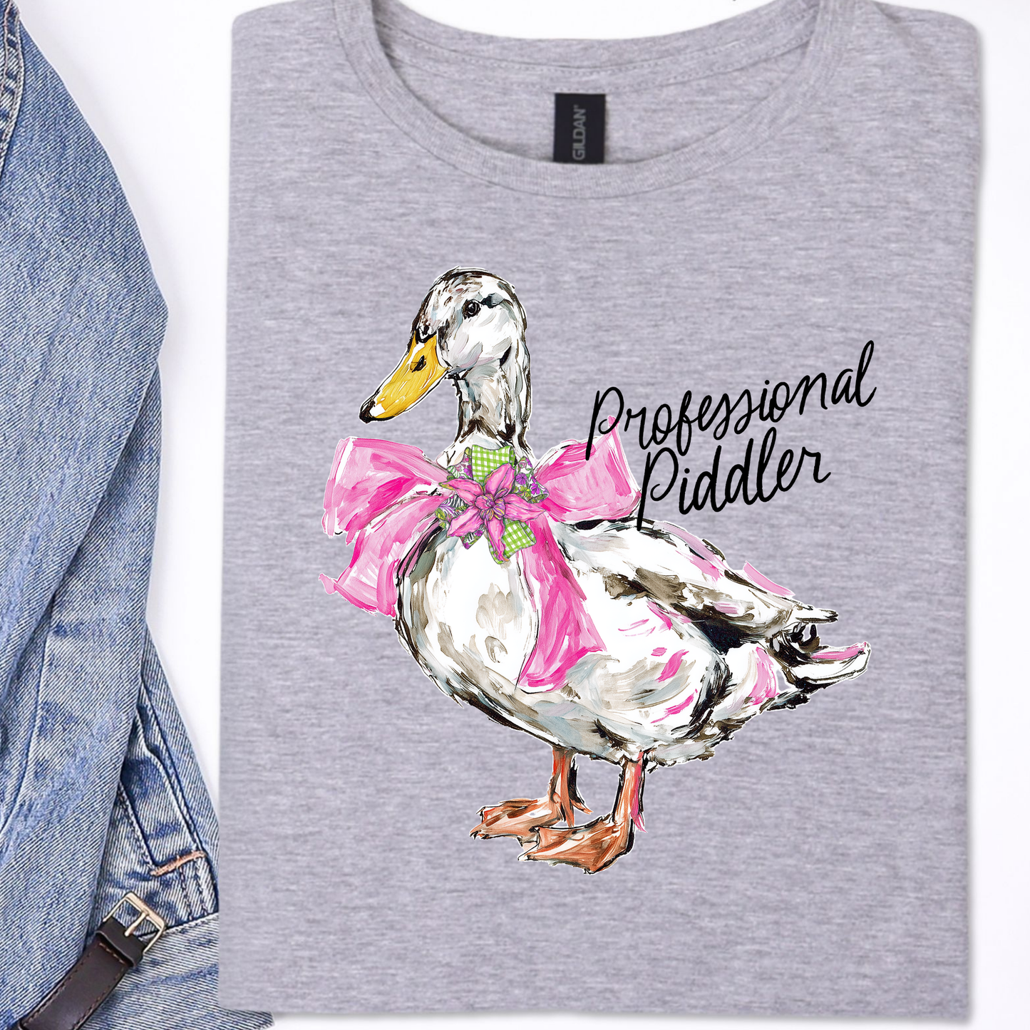 Gray t-shirt with a duck graphic and 'Professional Paddler' text