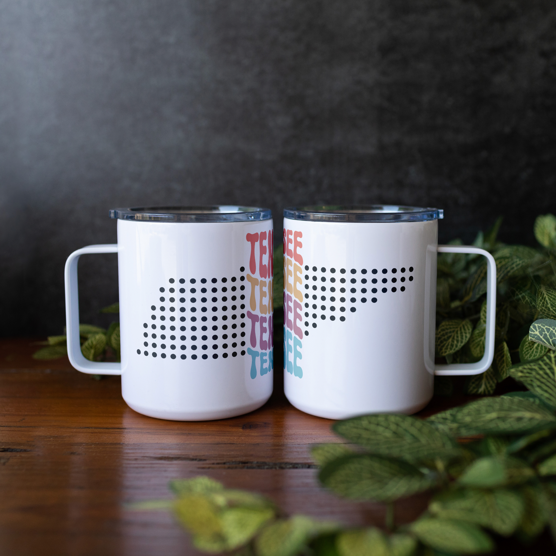 Tennessee_Word_Art_Travel_Mug_Insulated_Mug_Lifestyle_Wood_Table_Mockup.png